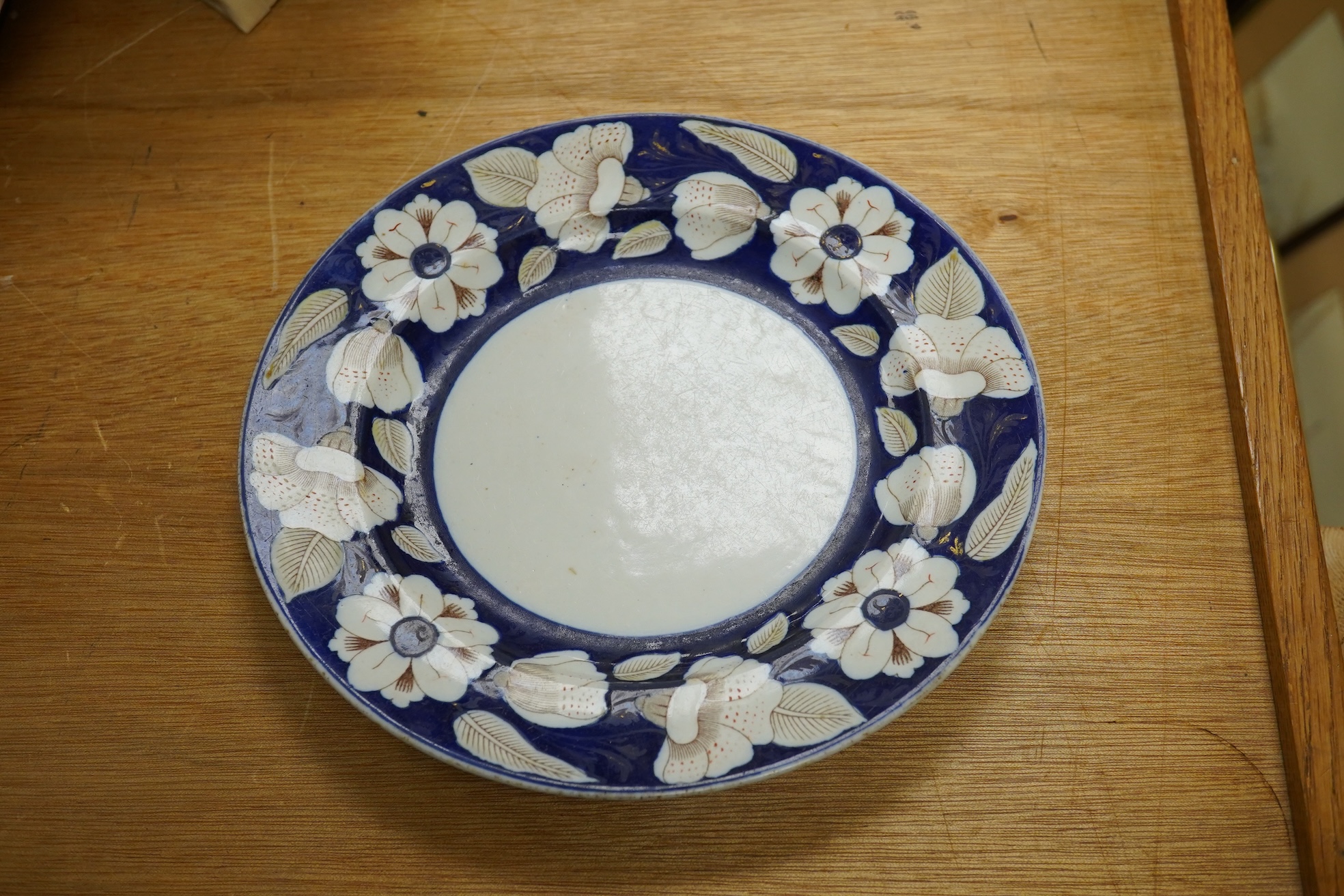 A Victorian Ironstone part set of floral decorated tableware. Condition - some items damaged